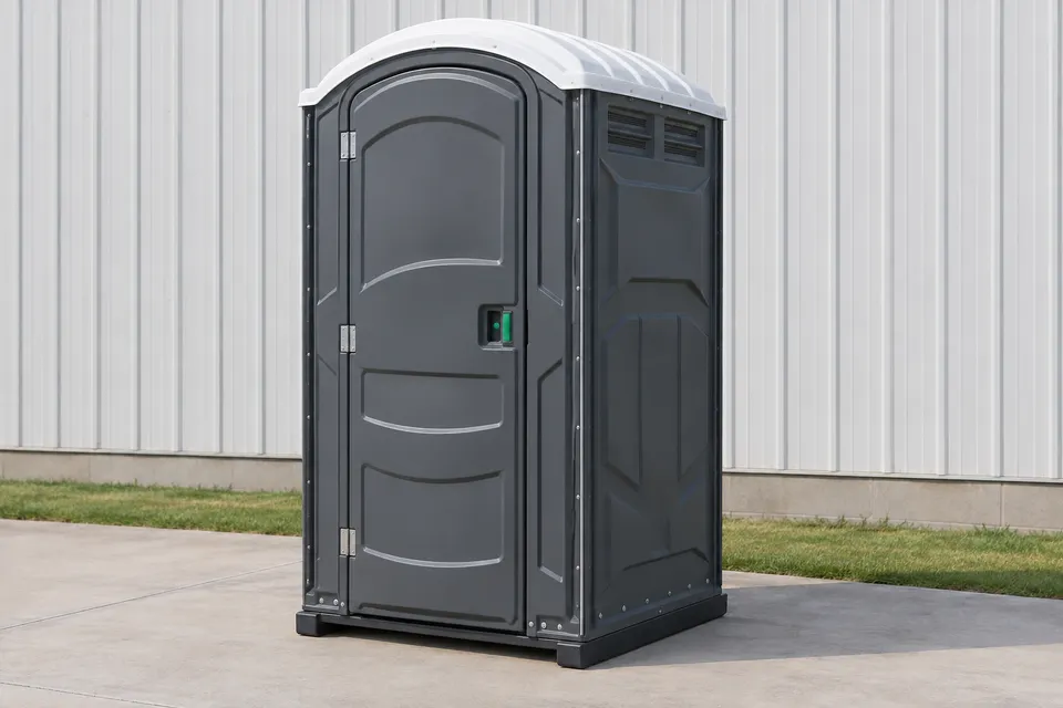 Standard portable toilet with full enclosure and level standing area